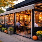 Custom commercial patio enclosure with fabric panels and awning on a restaurant patio in Edmonton Alberta